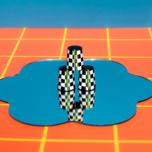Checkered Synth and DJ Knobs objects on a blue circular platform with a grid-patterned background